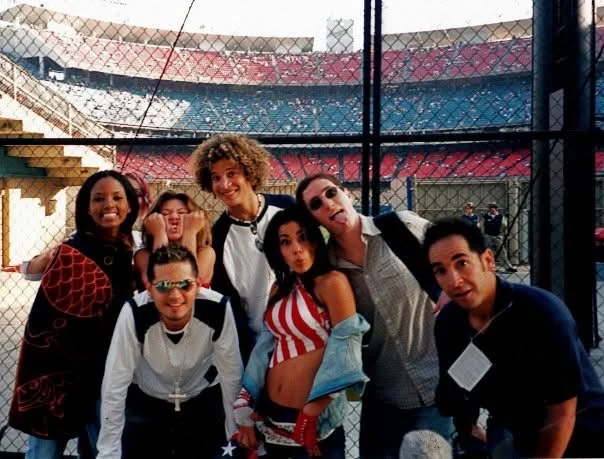 David Price with Kelly Clarkson, Justin Guarini and other American Idol contestants at a stadium.