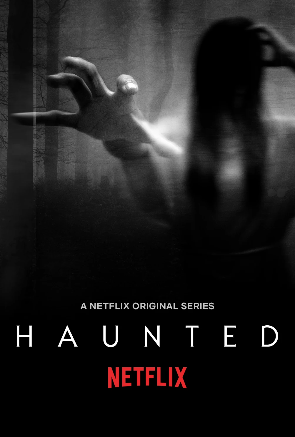 Haunted — official Netflix launch poster, a ghostly figure reaching through the shadows